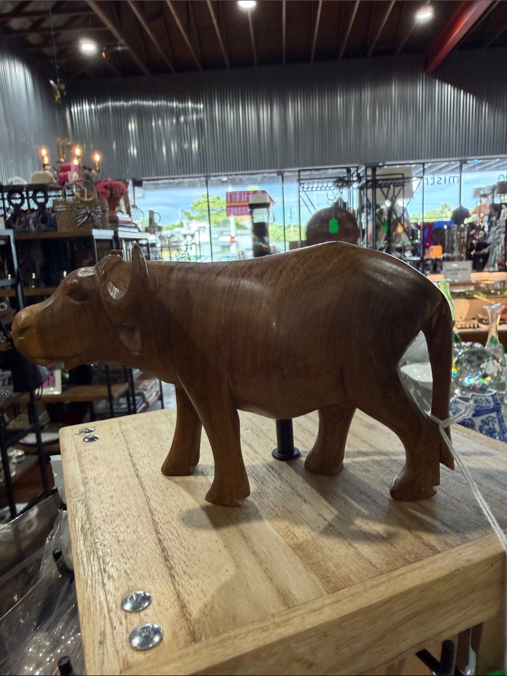 Hand-Carved Wooden Cow Figurine in Warm Brown